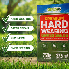 Grassias Premium Hard Wearing Grass Seeds 750g box displayed on a wooden surface against a soft-focus green garden background. Four green tick-mark badges on the left highlight key uses: Hard Wearing, Patch Repair, New Lawn, and Over Seeding. The box shows 750g net weight and 37.5m² coverage.